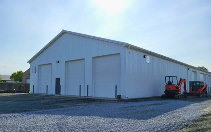 Warehouse - Titan Buildings Delaware Maryland pole building construction Large commercial warehouse metal building with multiple bay doors - Maryland construction services