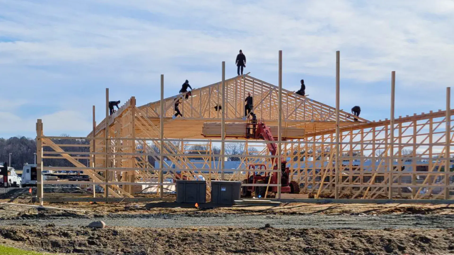 Titan Buildings crew framing a post-frame building in Delaware